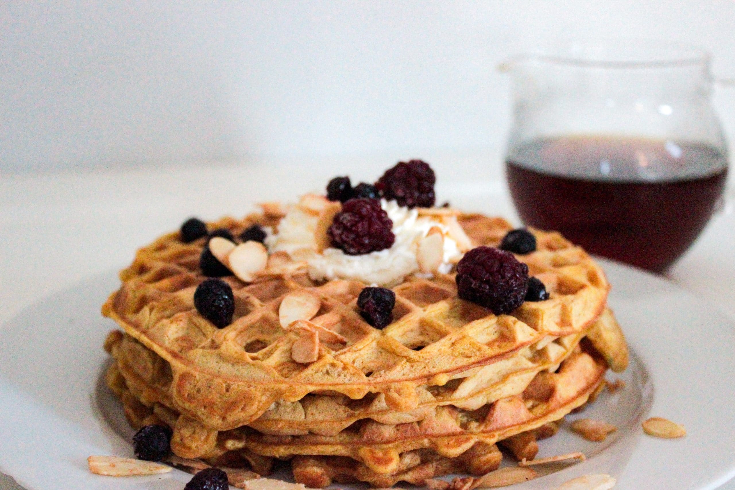 Pumpkin Spice Waffles with Caramelized Almonds and Homemade Whipped Cream